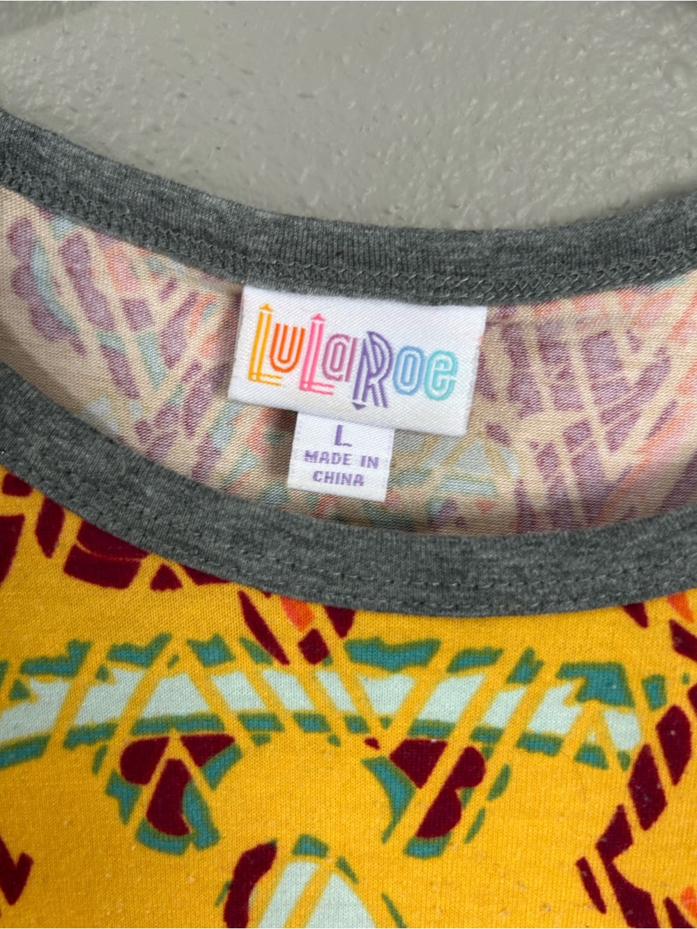 LuLaRoe Kids Yellow Multi-Color Patterned Short Sleeve Tee